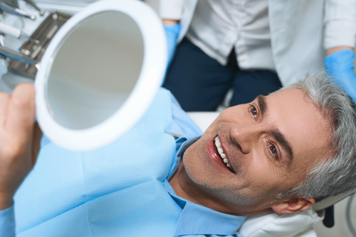 How can I make my dental implants heal faster